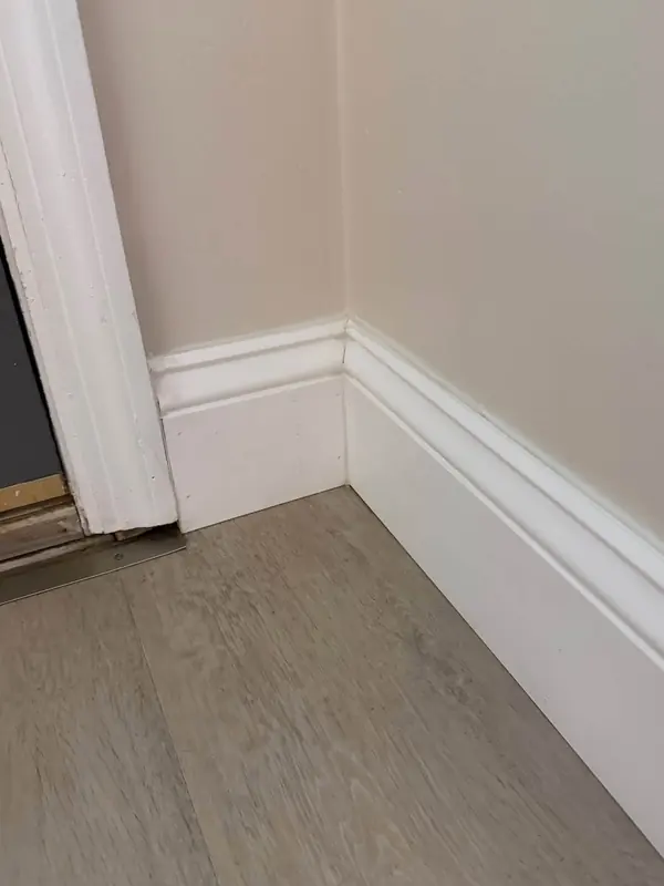 Baseboards after Josie cleaned it