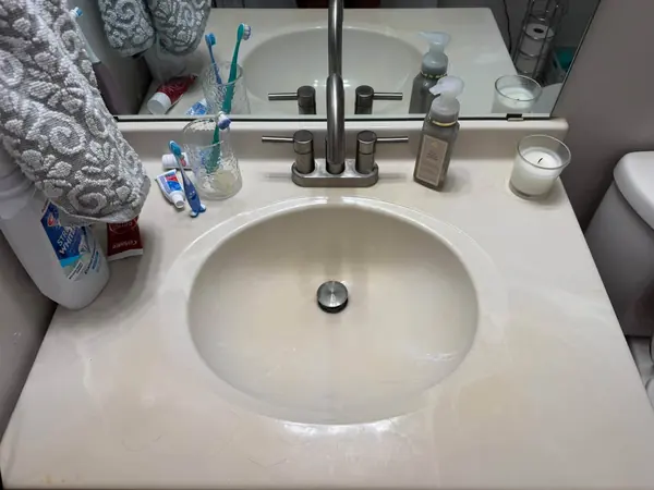 Bathroom sink before, with the dirt