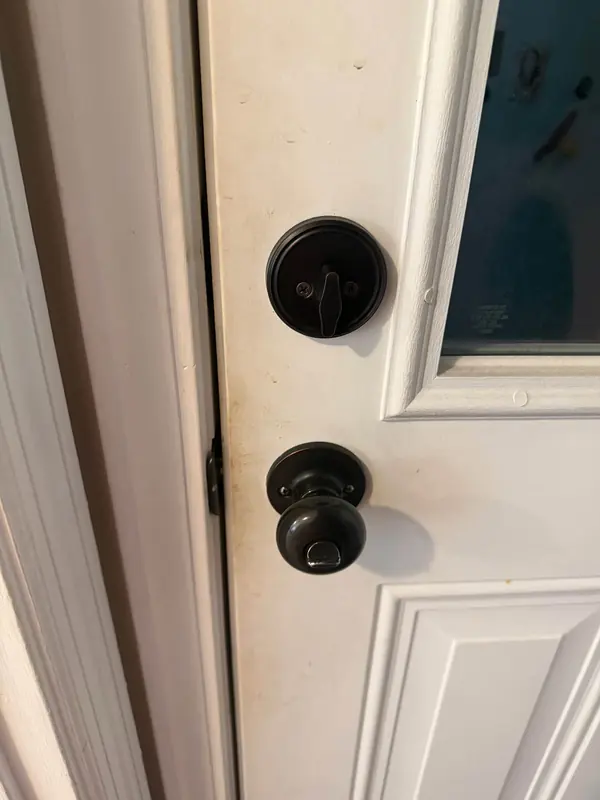 Door knob before, with the dirt