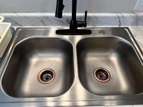 Kitchen sink after Josie cleaned it
