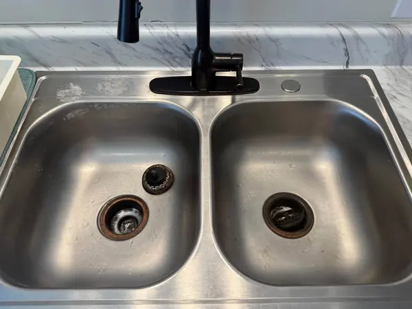 Kitchen sink before, with the dirt