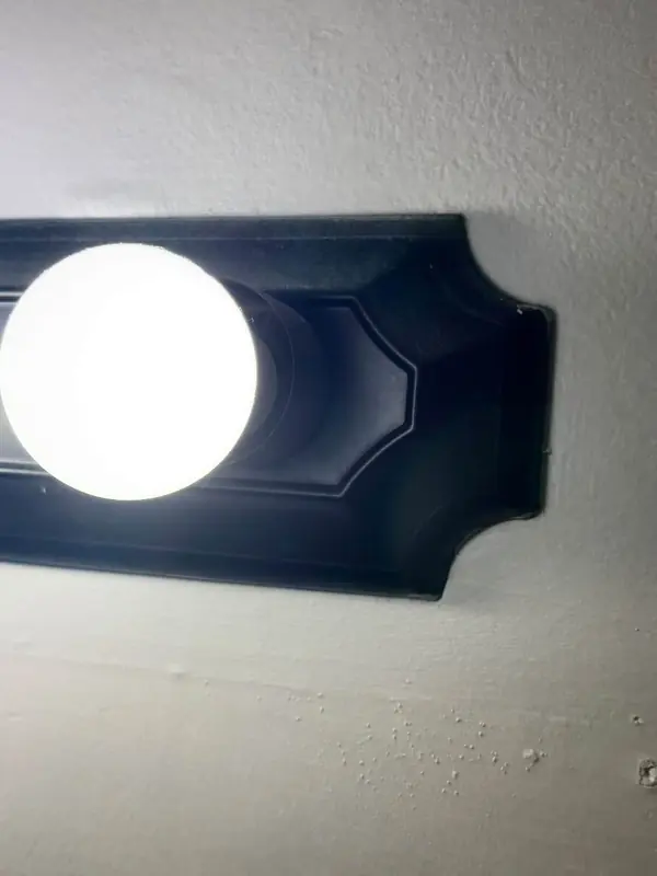 Vanity light after Josie cleaned it